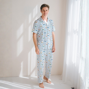 Man wearing the Men's Miffy Peek-a-Boo Blue bamboo pyjama set